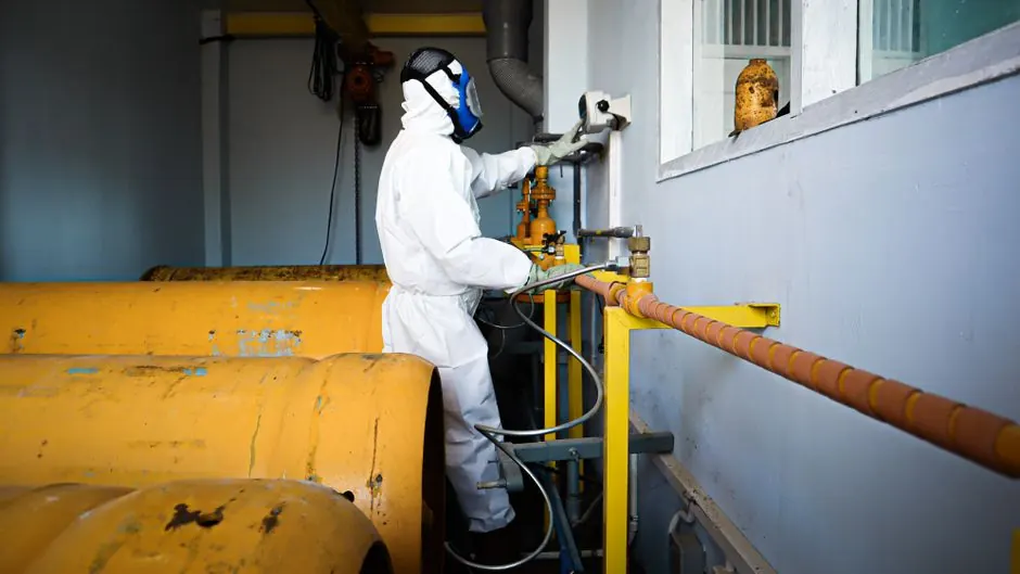 Why is professional hazmat cleanup necessary for industrial accidents?